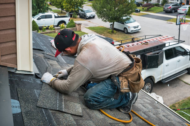 Professional Roofing technician working in Shelter Island Heights, NY